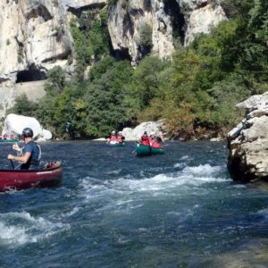 Navigating a rapid on the Ardeche river